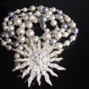Pearl necklace and star pin